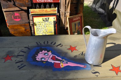 Kitchen table in a reconstructed military camp, showing Betty Boop. (image © Sheron Long)