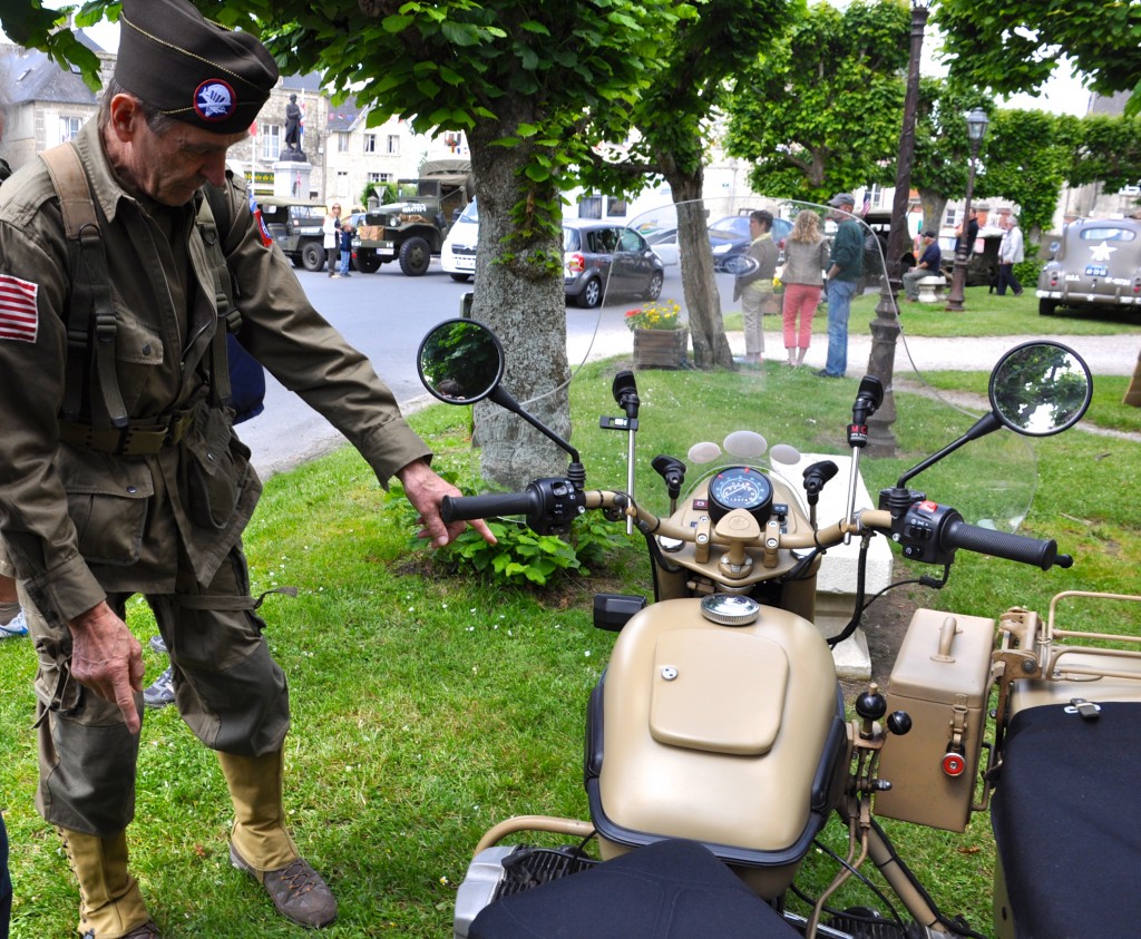 A post-war Soviet motorcycle based on German technology from the WWII period, shown at a reconstructed American military camp as part of a commemoration of the 70th Anniversary of D-Day, one of the great moments in history.  (Image © Sheron Long)