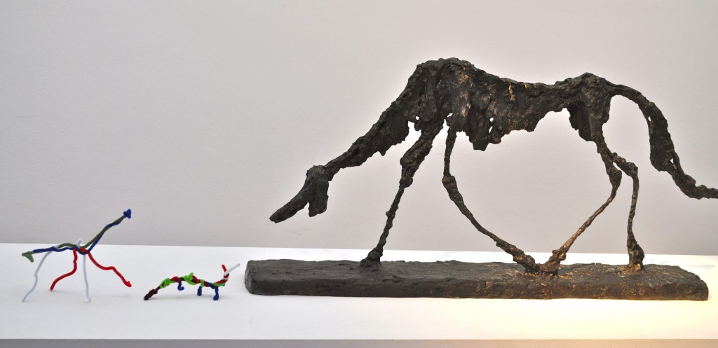 Bronze dog, inspiring art by Alberto Giacometti, alongside two student creations made from pipe cleaners  and illustrating an emotional connection with art. (Image © Sheron Long)