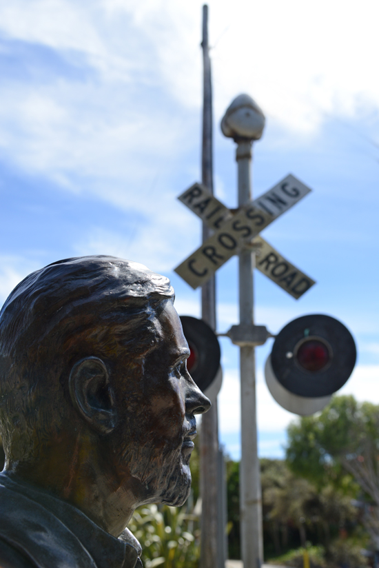 Memorial to Ed Ricketts at the train tracks on Cannery Row, the place where creative inspiration bloomed for John Steinbeck and Ed Ricketts (Photo © Meredith Mullins)
