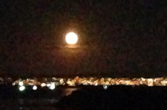Supermoon over Monterey harbor, offering creative inspiration in 2014 (Photo © Meredith Mullins)