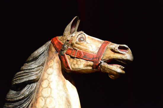 wooden carousel horse with red halter, creative expression from the Musée des Art Forains (Photo © Meredith Mullins)