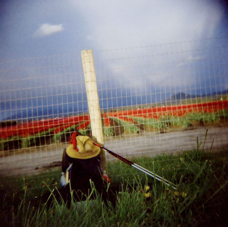 Wood's backpack leaning against a fence, showing how an on-foot traveler on a long-distance walk across America carries only a very few things. (Image © Cirrus Wood) 