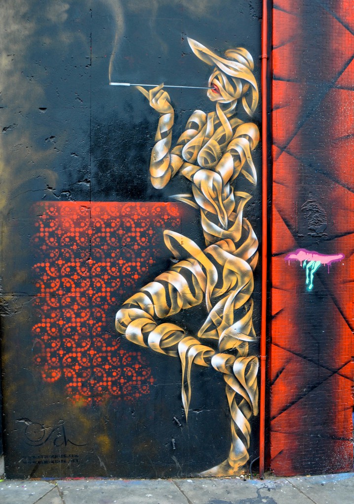 Street art showing a surreal figure smoking with cigarette butts and dropped gum littering the sidewalk in front. (Art © Otto Schade; photo © Sheron Long)