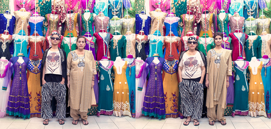 Indian grandmother and granddaughter swap clothes at a dress store for a generation gap experiment in conceptual photography by Qozop (Photo © Qozop)