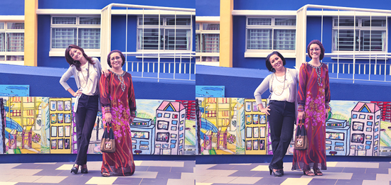 Malay mother and daughter on street swapping clothes for a generation gap experiment in conceptual photography by Qozop (Photo © Qozop)