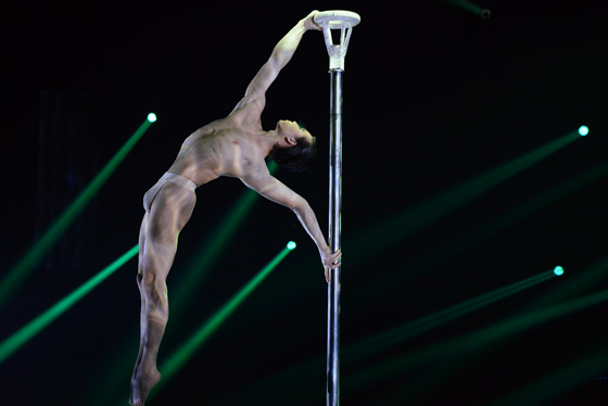 Travel pleasures provided by Li Tong, a circus performer from China showing the circus arts at the circus of tomorrow (Photo © Meredith Mullins)