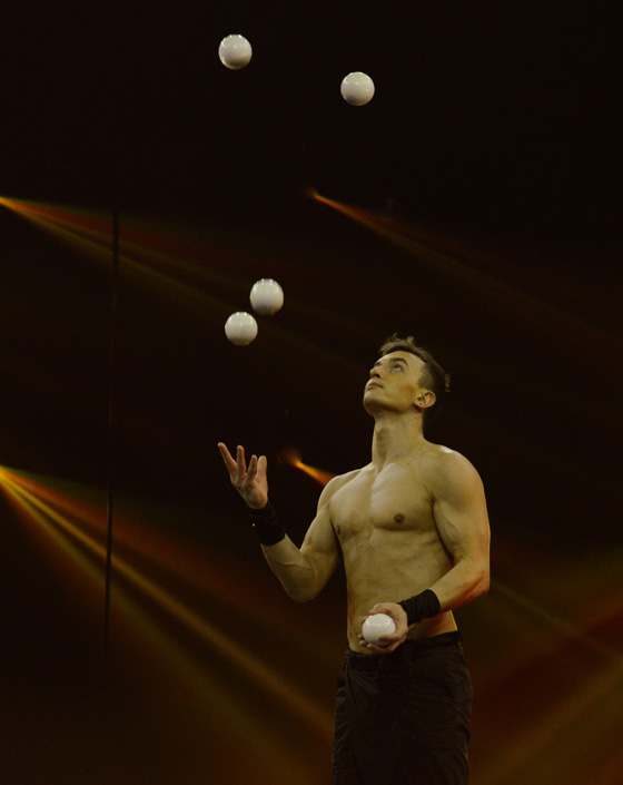 Travel pleasure provided by Dmitry Ikin, a circus performer at the circus of tomorrow, presenting juggling as circus arts (Photo © Meredith Mullins