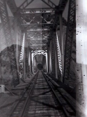 A railway bridge, illustrating a place to spend the night during an on-foot traveler's long-distance walking trip across America. (Image © Cirrus Wood) 