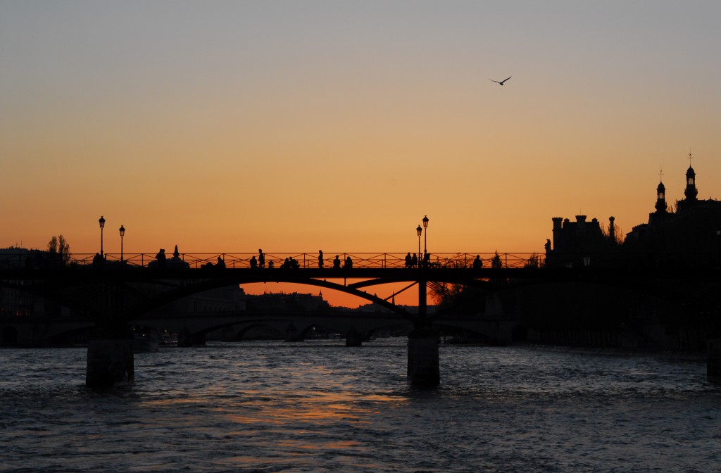 Pont des Arts at sunset, before the love locks came, true romance in Paris and an answer to the question "Can love conquer all?" (Photo © Meredith Mullins)
