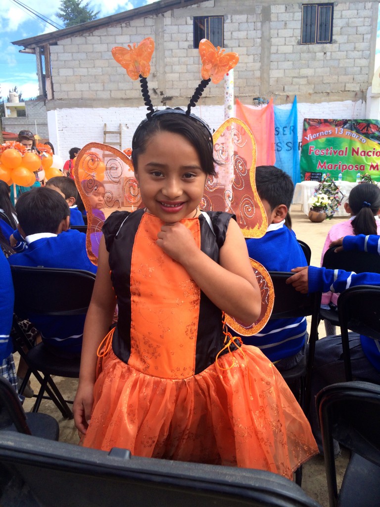 Young student dressed up like a monarch butterfly, illustrating school efforts to develop global citizens who care about the monarchs' decline. (Image © Carol Starr)