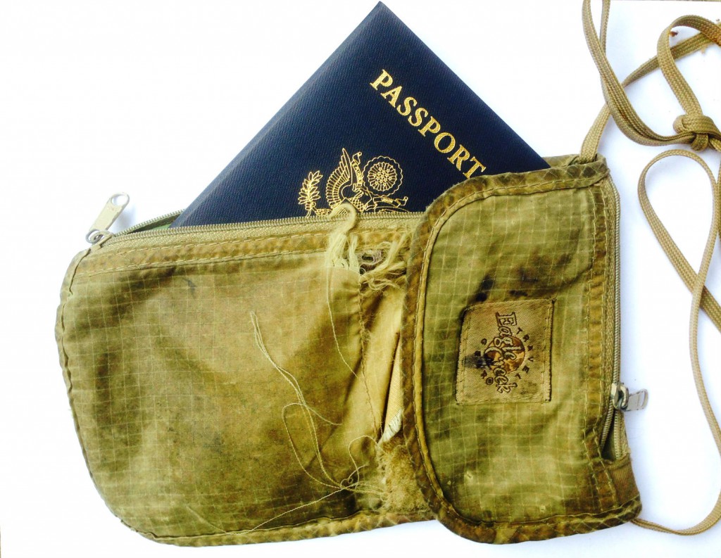 An old travel wallet with passport, illustrating the lost item of a travel ninja. (image © Eva Boynton)