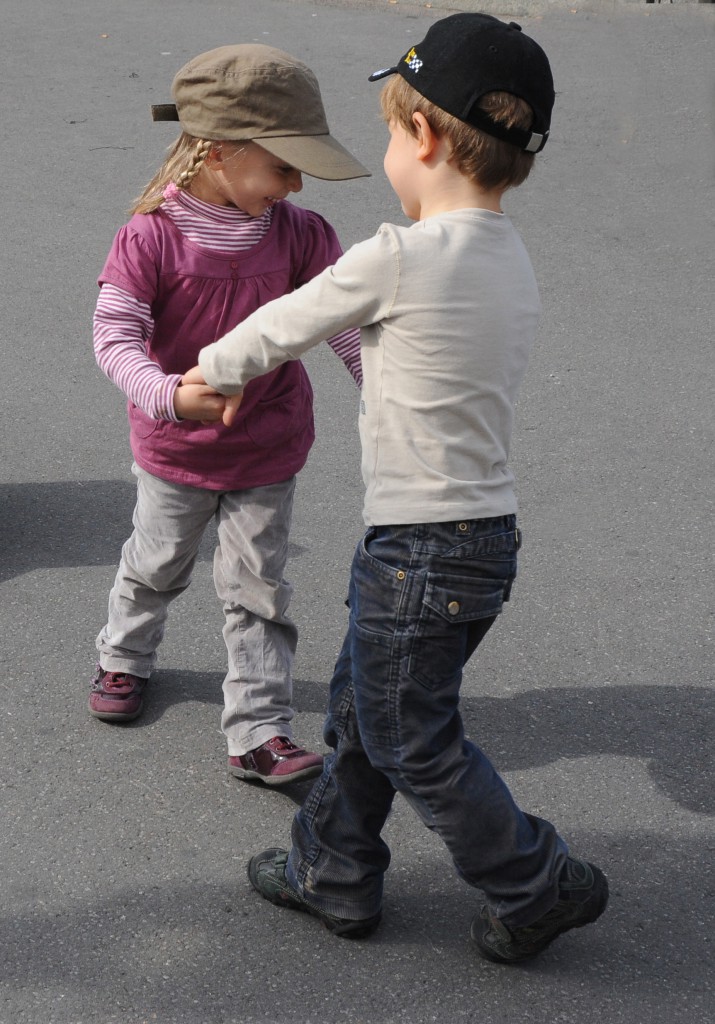 Children dancing at le petit bal musette on the rue mouffetard, showing the universal language of music. (Image © Meredith Mullins)