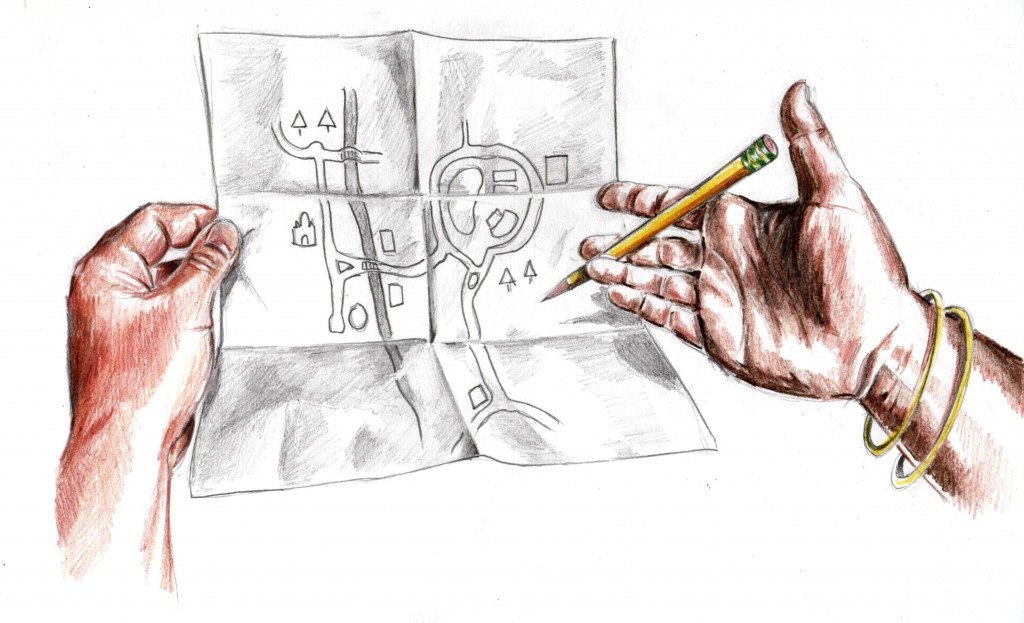 A hand holding a piece of paper with a map and another hand holding a pencil, showing a method of communication and breaking the language barrier. (image © Eva Boynton)