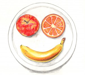 Drawing of a face on a plate with an apple and an orange slice for eyes and a banana for a mouth, showing how a smile can break the language barrier. (Image © Eva Boynton)