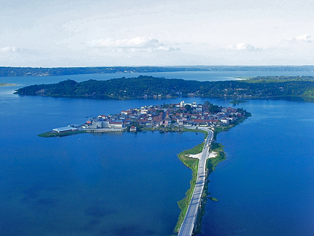 Aerial view of Isla de Flores in northern Guatemala, a beautiful memory recalled during post-Vacation blues. (Image © Rafael Amado Deras)