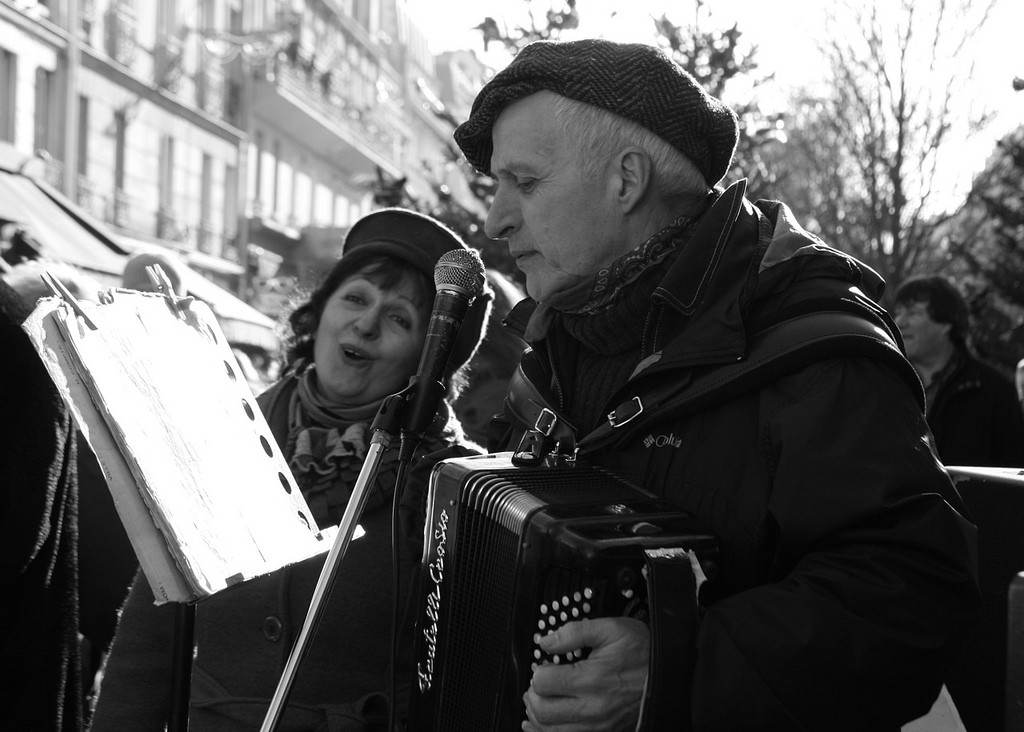 Christian Bassoul at le petit bal on the rue Mouffetard, showing the universal language of music. (Image © Virginia Kelser Jones)