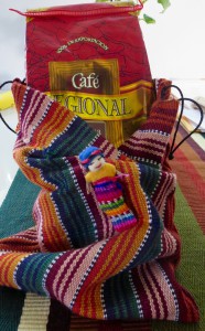 Bag of Guatemalan coffee in a Guatemalan textile bag with a worry doll, part of a strategy to get over the post-vacation blues. (Image © Sally Baho)