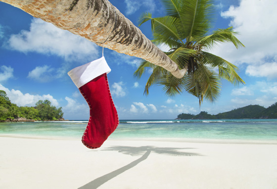 Christmas stocking on tropical island, one of the holiday traditions that shows cultural differences. (Image © E.M. Prize/iStock.)