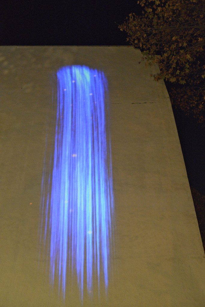 Blue waterfall, Particle Falls, by Andrea Polli, an art work by one of the global citizens focused on climate change. (Image © Meredith Mullins.)