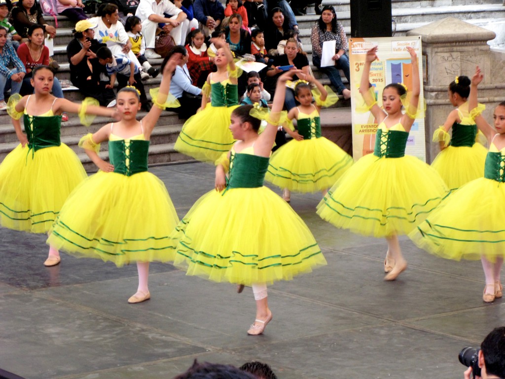 Ballarinas dancing in a group, showing how Mexican dances can go across cultures. (Image © Eva Boynton)