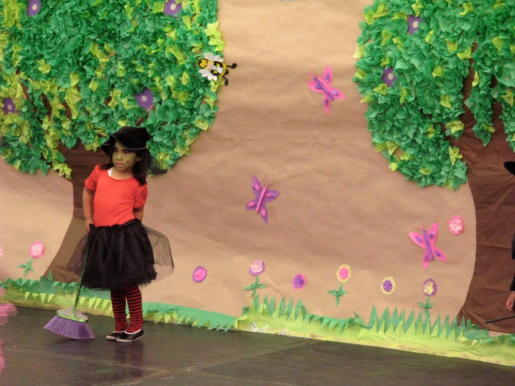 Mexican girl performing a dance as the wicked witch from The Wizard of Oz, showing how performers in Mexico go across cultures in Mexican dances. (Image © Eva Boynton)  