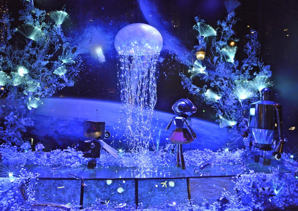 Store window with jellyfish and metal characters, at Galeries Lafayette in Paris, one of the holiday traditions that shows cultural differences. (Image © Meredith Mullins.)