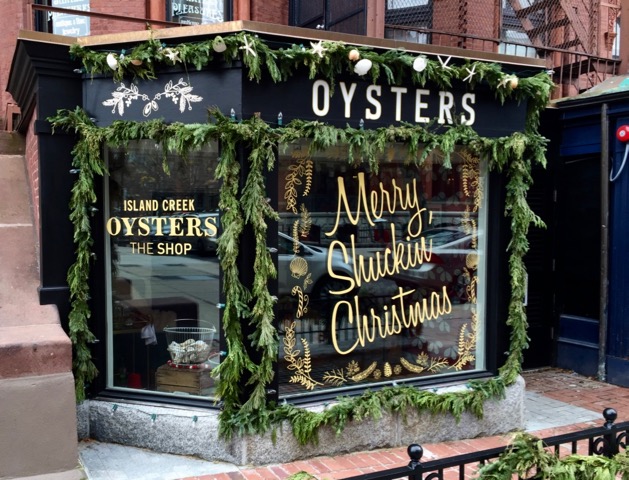 Oyster store Christmas window in Boston, one of the holiday traditions that shows cultural differences. (Image © Jerry Fielder).