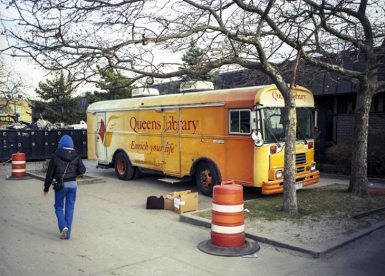 Yellow Queens Library Bookmobile, one of the public libraries that shows America's cultural heritage. (Image © Robert Dawson.)