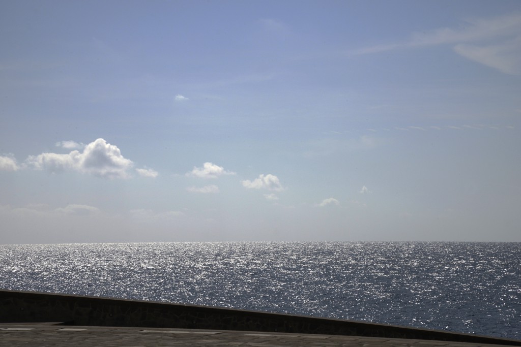 Sparkling ocean at the Santa Cruz de Tenerife Symphony Hall, part of the carnival celebrations in the Canary Islands and travel adventures of the best kind. (Image © Meredith Mullins.)