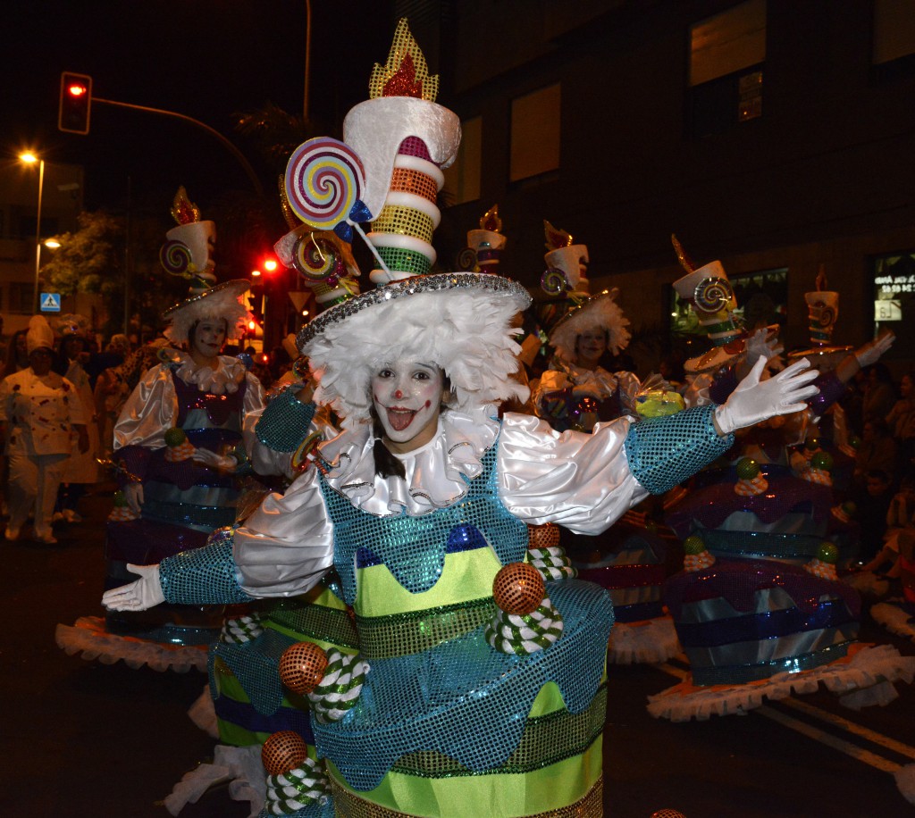 Clown in the carnival celebrations of the Canary Islands; travel adventures of the best kind. (Image © Meredith Mullins.)