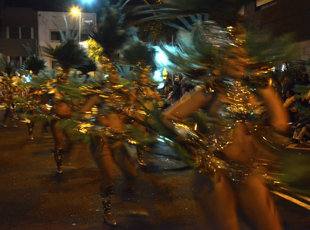 Sequined dancers in the carnival celebrations of the Canary Islands, travel adventures of the best kind. (Image © Meredith Mullins.)