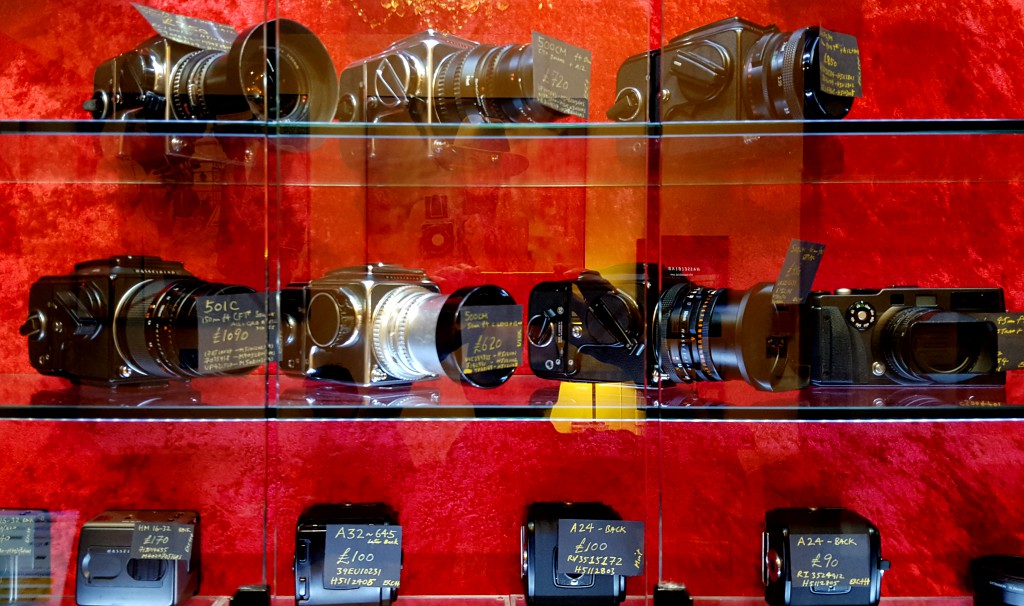 Cameras on display at the Camera Museum, part of London's coffee culture and a place to slow down and see things differently. (Image © Camera Museum)