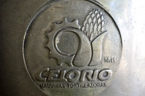 Close-up of the Fausto Celorio brand on a tortilla-making machine, illustrating how tortilla making connected to Mexico's cultural heritage and traditions, is still prominent in modern Mexican culture. (Image © Eva Boynton)