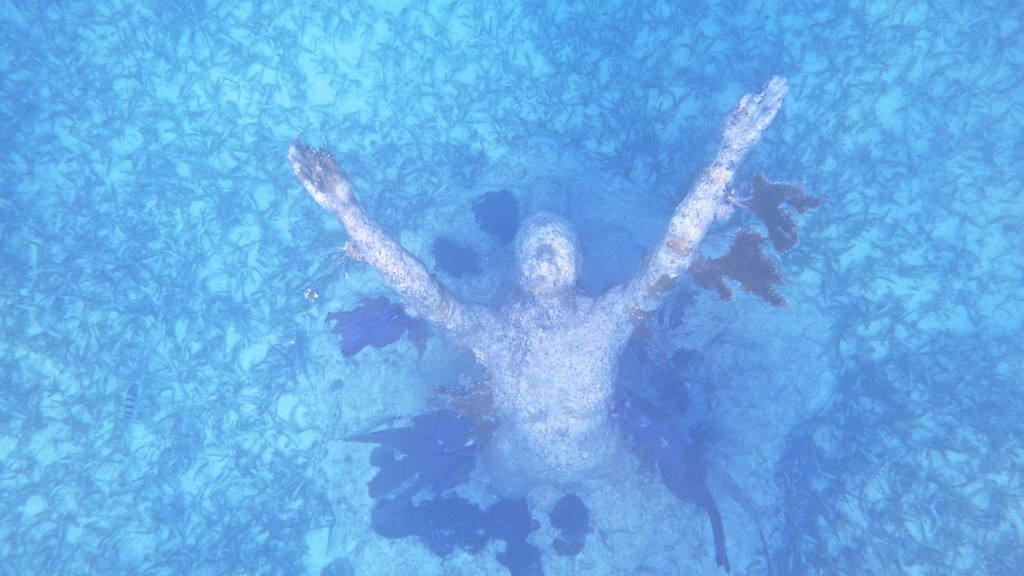 A view of the sculpture "Reclamation" in Jason deCaires Taylor's underwater, showing the innovations of both artist and ocean. (image © Eva Boynton).