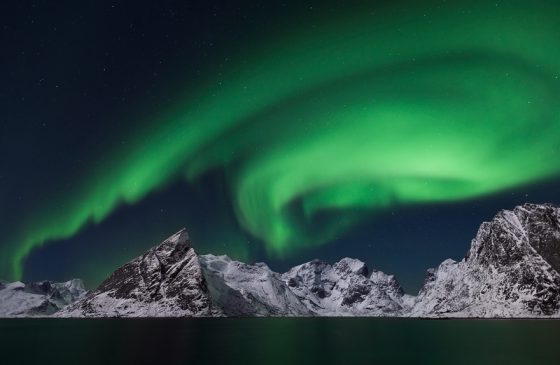 Aurora borealis in Norway, landscape photography that allows a virtual journey and a celebration of Earth Day. (Image © Bjorn Billing.)