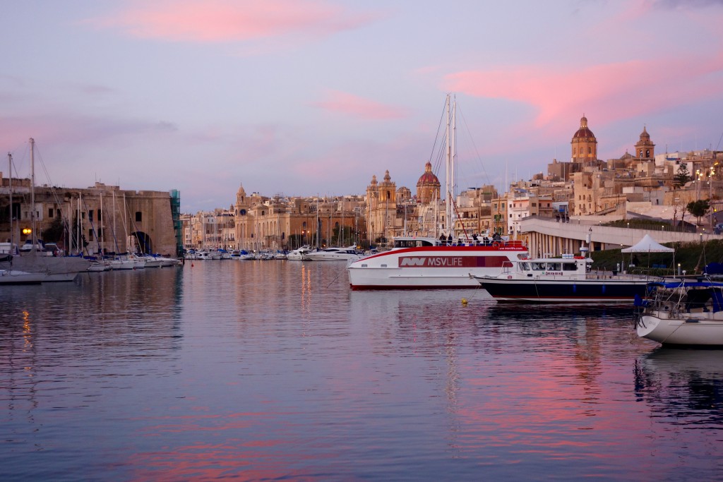 Boats line Senglea marina in Malta, a place that inspired Edward Lear's wanderlust, wordplay, and watercolor paintings. (Image by Joyce McGreevy)