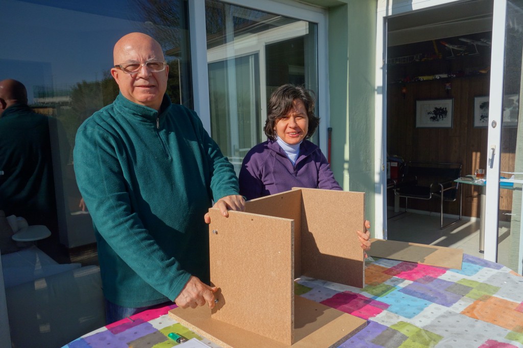 Employees at Baraka Consulting assemble a pet house to house one of the stray cats of Istanbul, thereby preserving a Turkish tradition and cultural heritage. (Image © Joyce McGreevy)