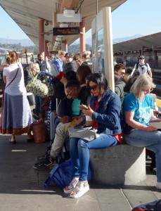 At Union Station in Los Angeles, CA, travel anticipation meets patience as passengers wait for a train journey to begin. Image © Joyce McGreevy