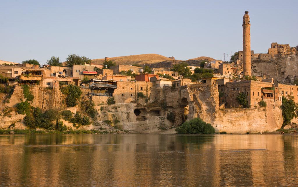 Hasankeyf, Turkey, and ancient town that provides travel inspiration to Paul Salopek on his Out of Eden walk. (Image © Asafta/iStock.)