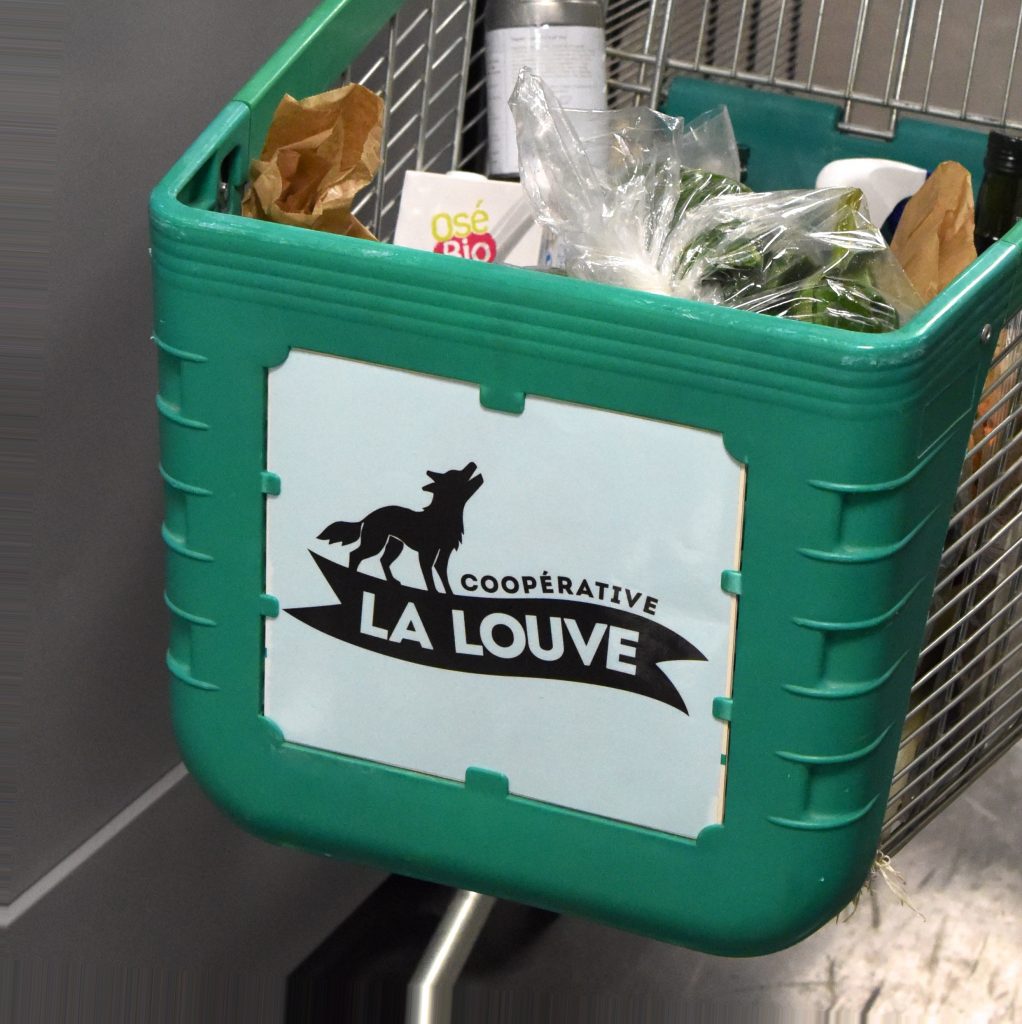 Shopping cart at the Paris food co-op La Louve, an experiment in blending different cultures. (Image © Meredith Mullins.)