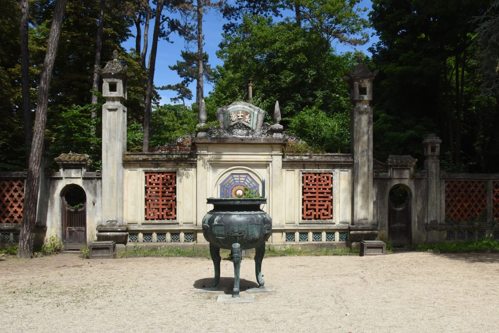 Indochina structure in the Jardin d'Agronomie Tropicale, one of the hidden gardens in Paris where you are traveling the world. (Image © Meredith Mullins.)
