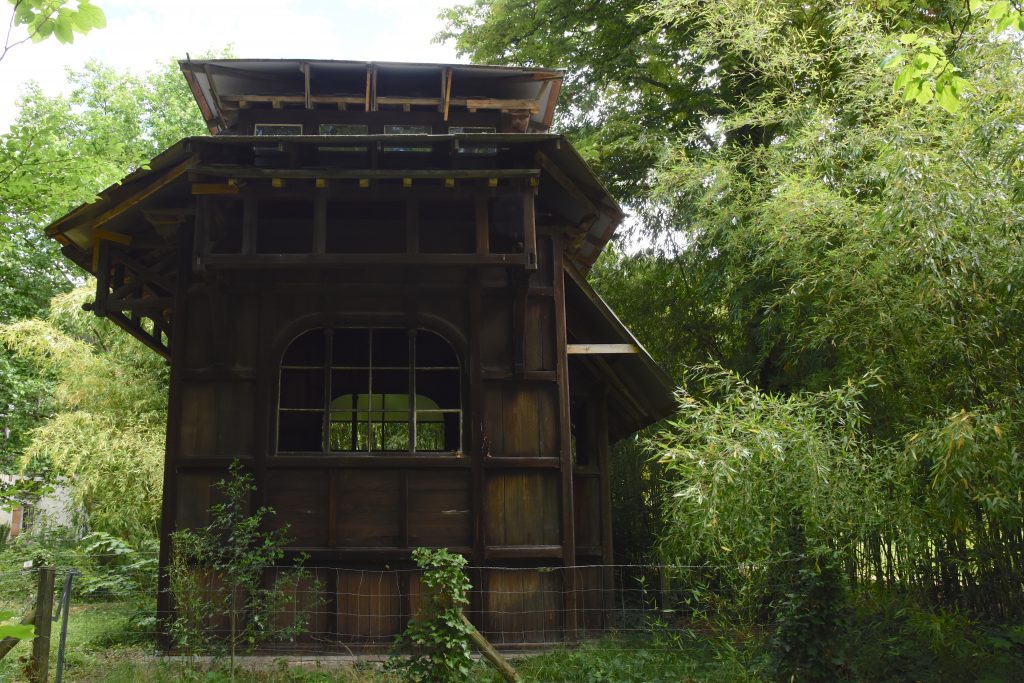 Réunion pavilion at the Jardin d'agronomie Tropicale, one of the hidden gardens of Paris where visitors can travel the world. (Image © Meredith Mullins.)