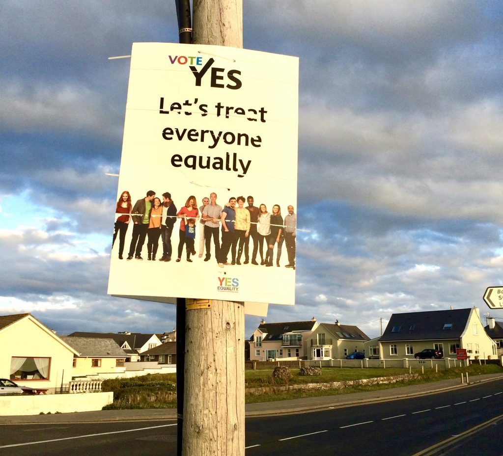A sign in Lahinch, Ireland advocating for equal rights dispels cultural stereotypes tourists often have about traditional societies. (Image © Joyce McGreevy)
