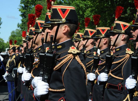 The Bastille Day military parade in Paris France, part of crossing cultures in celebration of Independence Day. (Image © Meredith Mullins.)