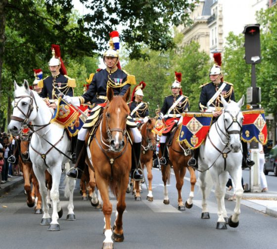 The Guard Republican on Bastille Day in Paris, part of crossing cultures in celebration of independence. (Image © Meredith Mullins.)