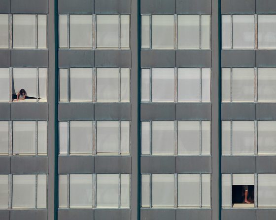 Building with view of two private spaces, part of Michael Wolf's Transparent City series, crossing cultures to show life in cities. (Image © Michael Wolf.)