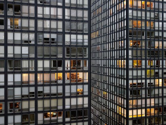 Office building in Chicago, part of Michael Wolf's Transparent City series, crossing cultures to show life in cities. (Image © Michael Wolf.)