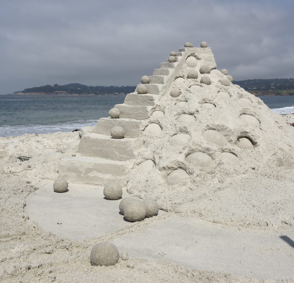 Sand sculpture with balls at the Great Carmel Sand Castle Contest, discovering the art of sand sculptures. (Image © Meredith Mullins.)