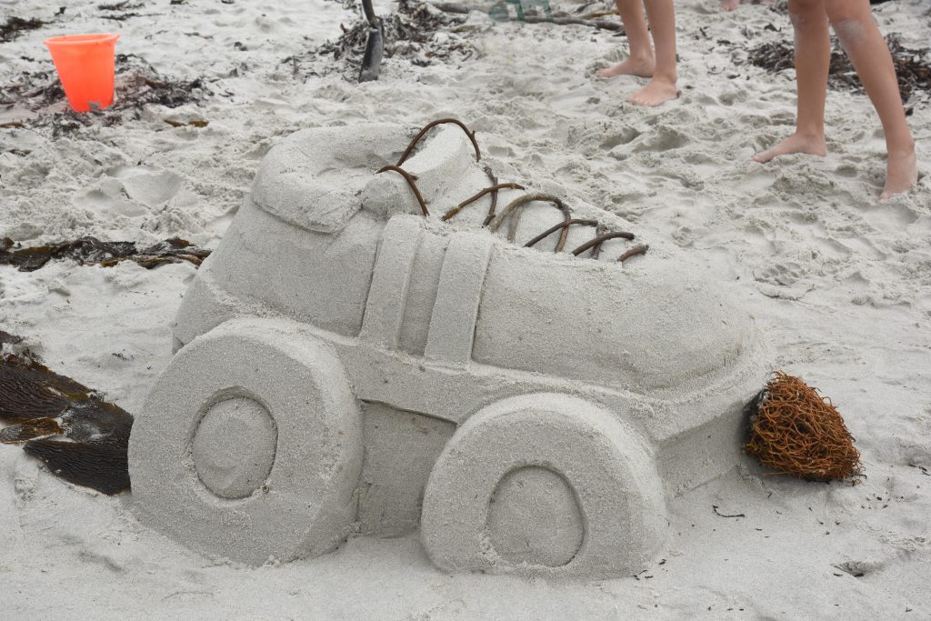 Roller skate sand sculpture at the Great Carmel Sand Castle Contest, discovering the art of sand sculptures. (Image © Meredith Mullins.)